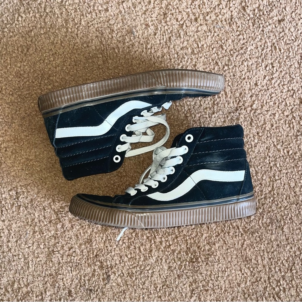 Black suede hi-top vans with gum sole